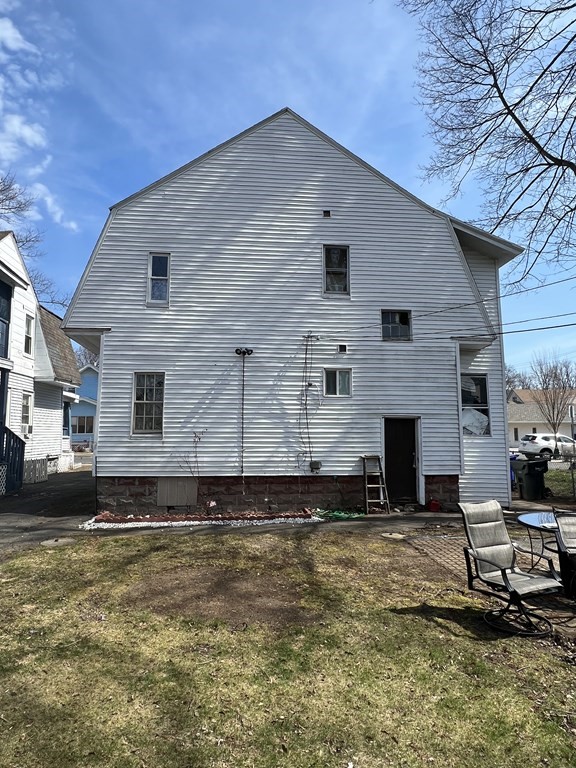 68-70 Suffolk Street Springfield, MA 01109 - Photo 14 of 19 a front view of a house with a yard