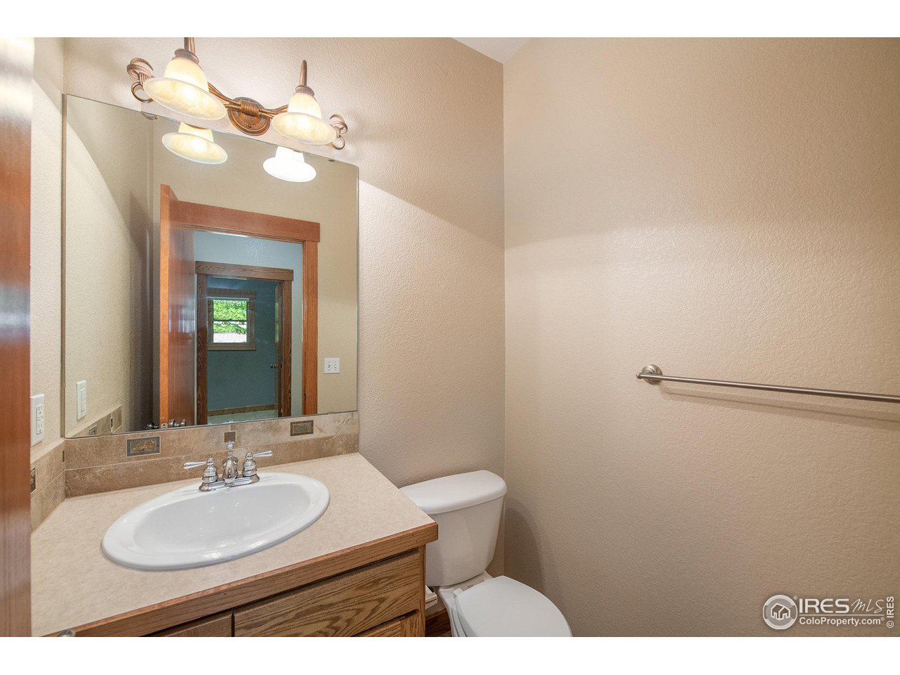 4244 Rolling Gate Road Fort Collins, CO 80526 - Photo 16 of 40 Main Level Half Bath