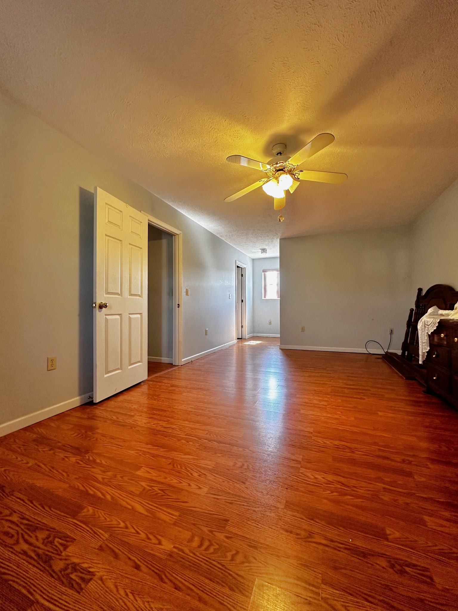 1691 Mullins Road Russellville, TN 37860 - Photo 11 of 23 a view of an empty room with a window and wooden floor