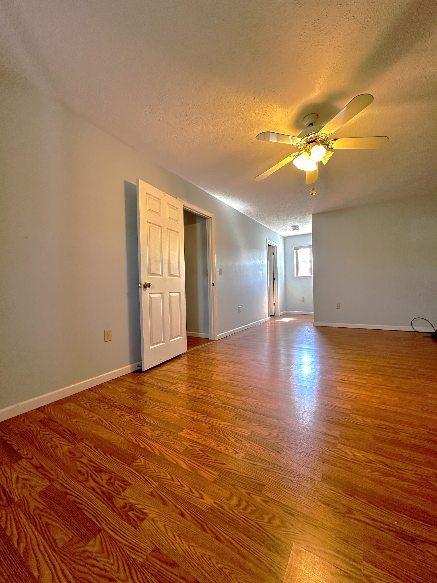 1691 Mullins Road Russellville, TN 37860 - Photo 12 of 23 a view of a room with a flat screen tv and wooden floor