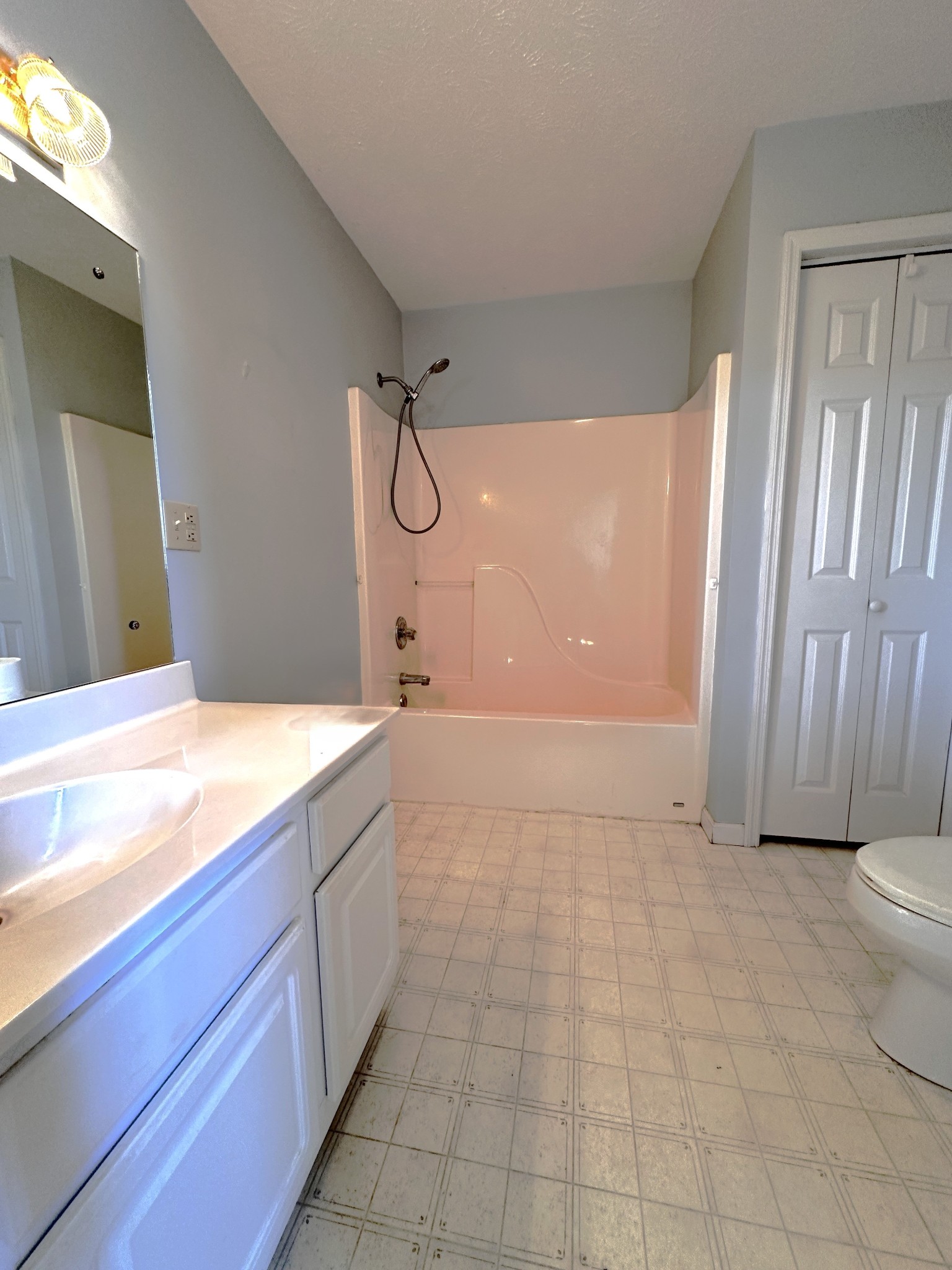1691 Mullins Road Russellville, TN 37860 - Photo 14 of 23 a bathroom with a granite countertop bathtub sink vanity and toilet