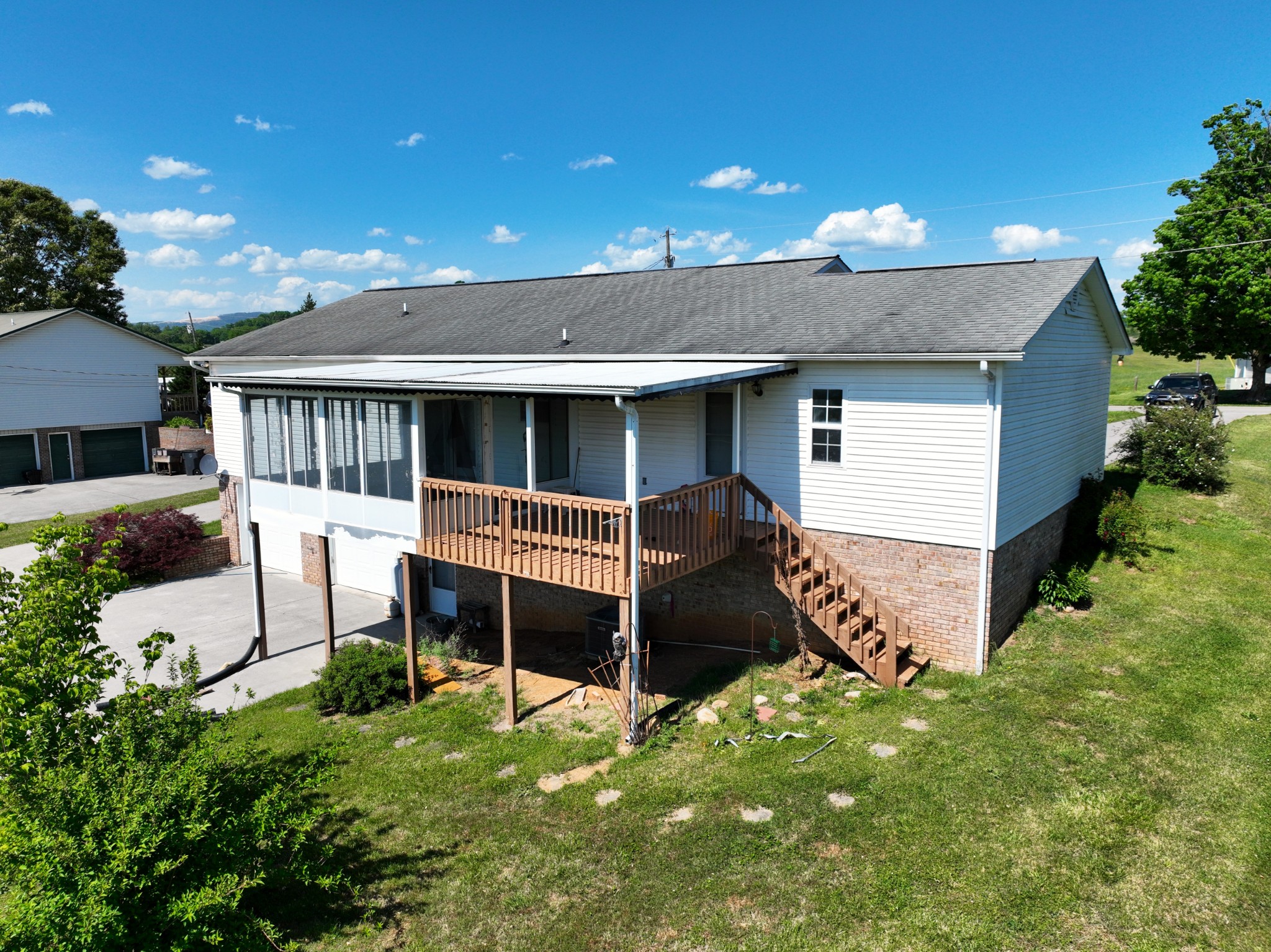 1691 Mullins Road Russellville, TN 37860 - Photo 17 of 23 a view of a house with a yard