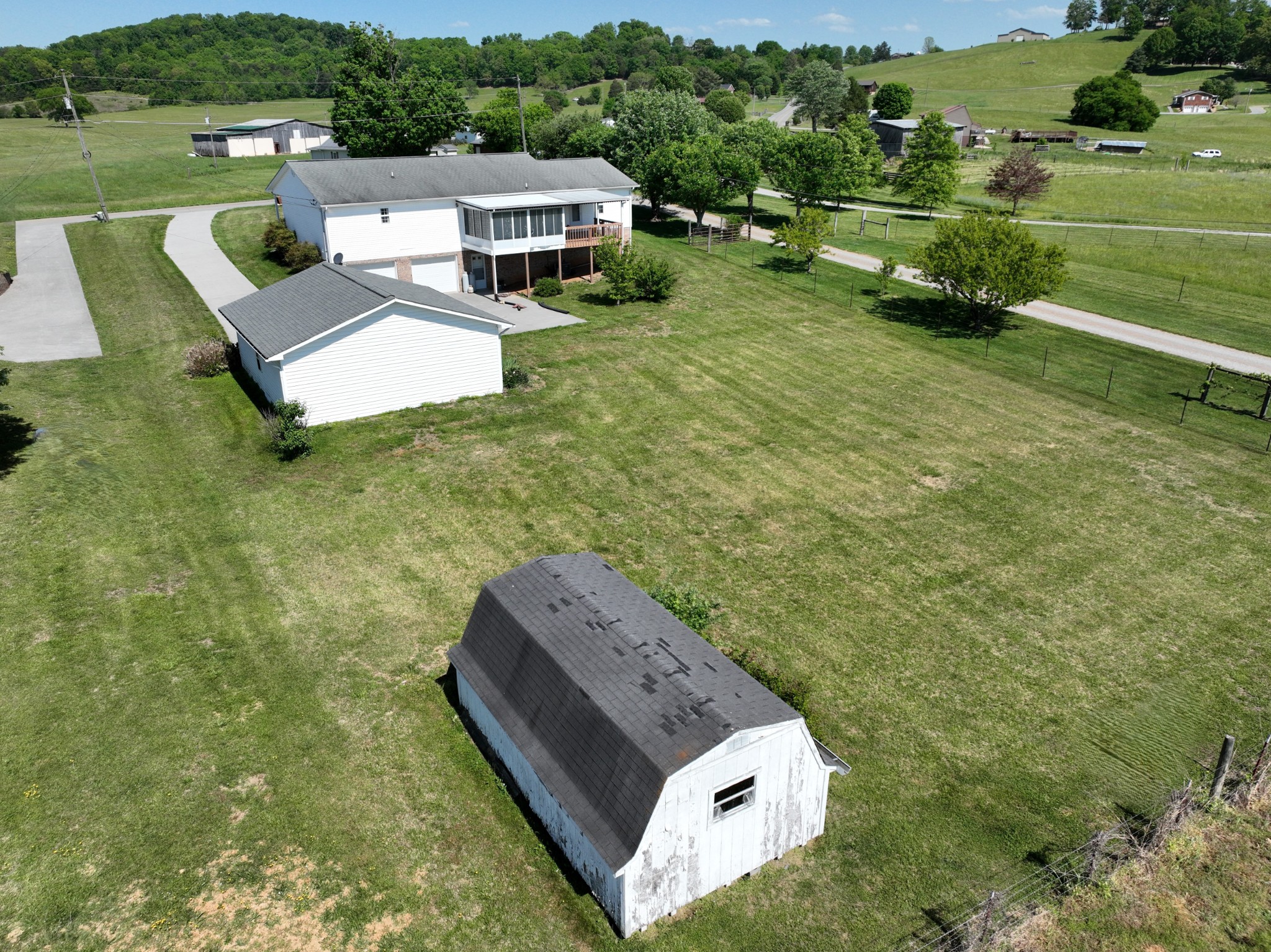 1691 Mullins Road Russellville, TN 37860 - Photo 18 of 23 an aerial view of a house with garden space and street view