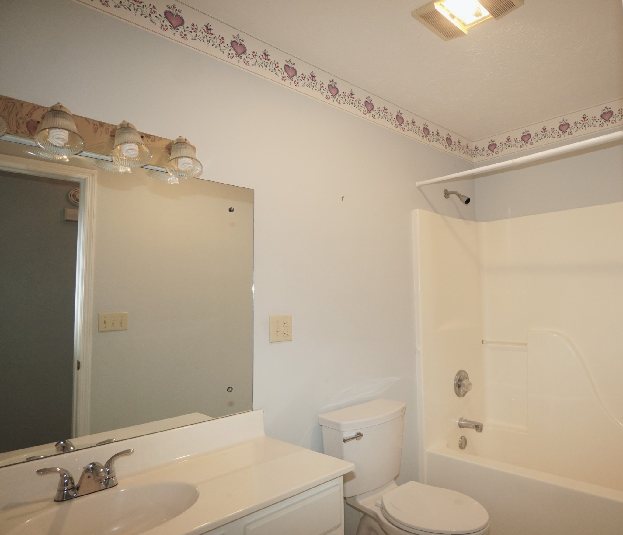 1691 Mullins Road Russellville, TN 37860 - Photo 6 of 23 a bathroom with a sink a toilet and shower