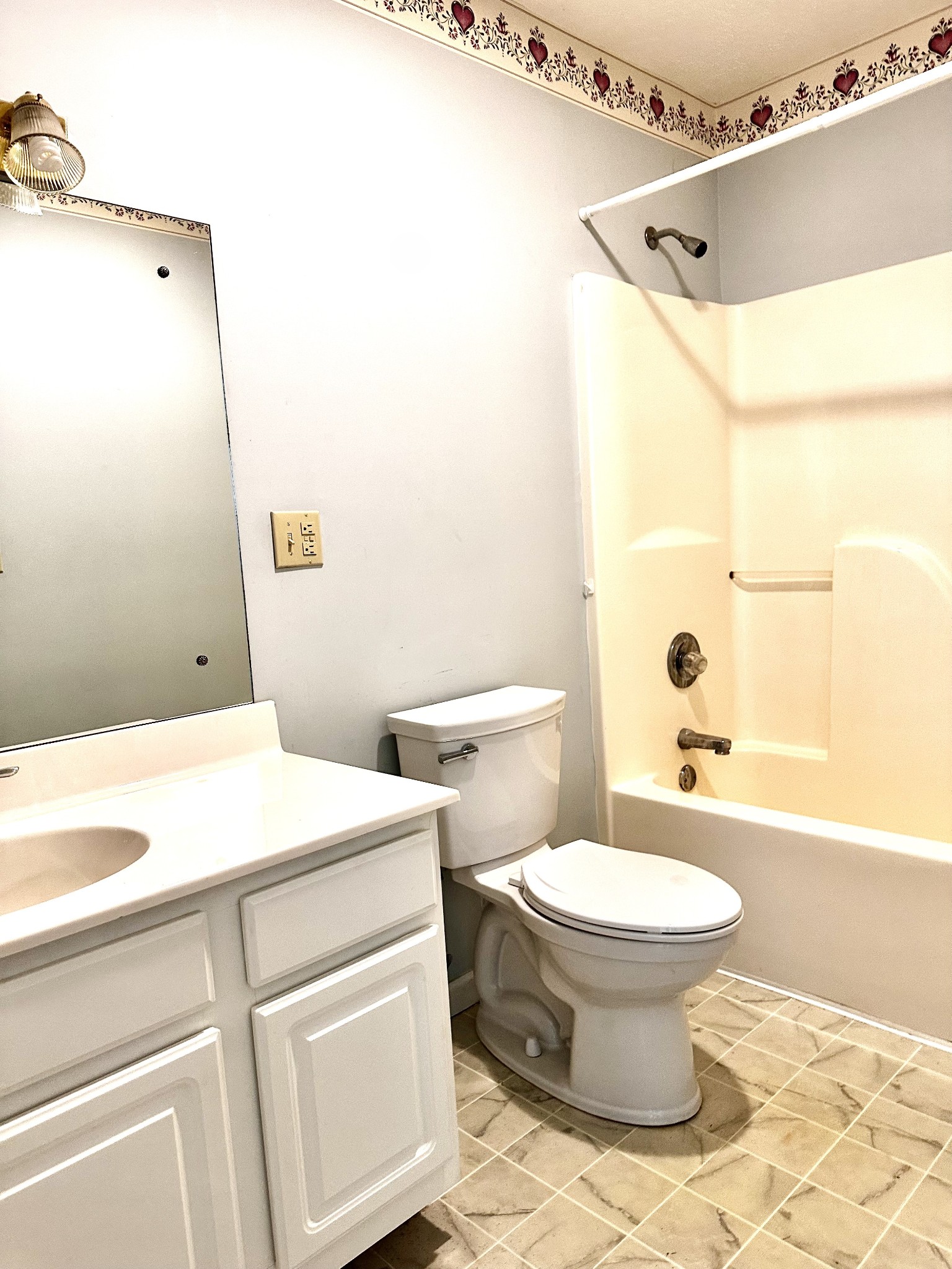 1691 Mullins Road Russellville, TN 37860 - Photo 8 of 23 a bathroom with a sink toilet and shower