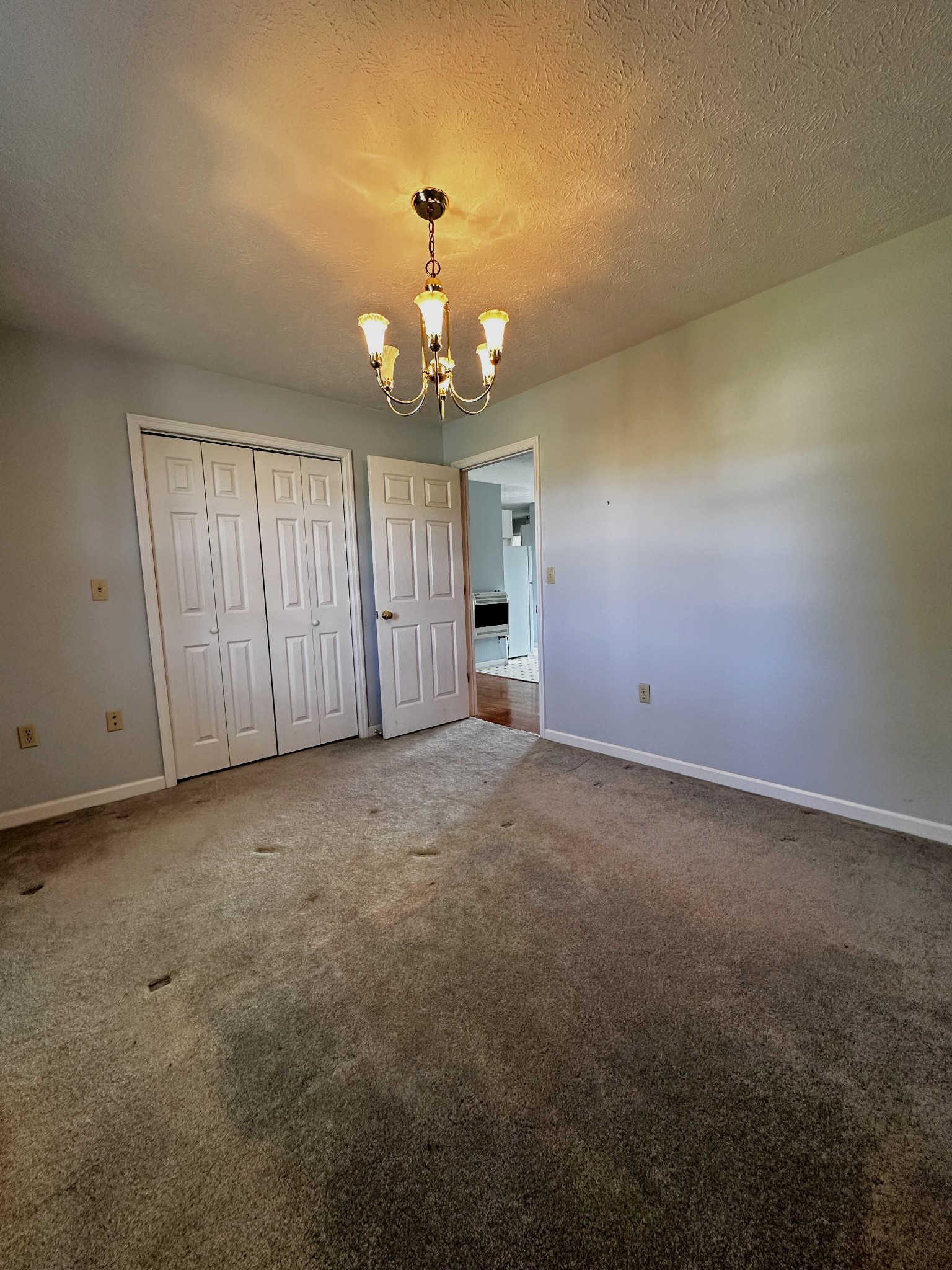 1691 Mullins Road Russellville, TN 37860 - Photo 10 of 23 a view of a livingroom with a chandelier