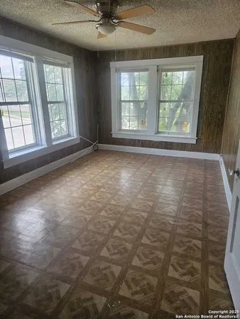 an empty room with windows