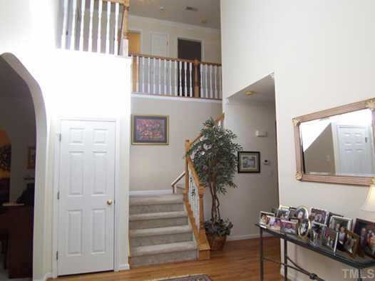 2905 Funster Lane Raleigh, NC 27615 - Photo 2 of 12 The covered front porch leads to the large, hardwood-floored 2-story tall Foyer w/crown molding. The entire 1st floor offers 9' ceilings, deep crown molding, gleaming hrdwd flrs & like-new neutral carpet. Other