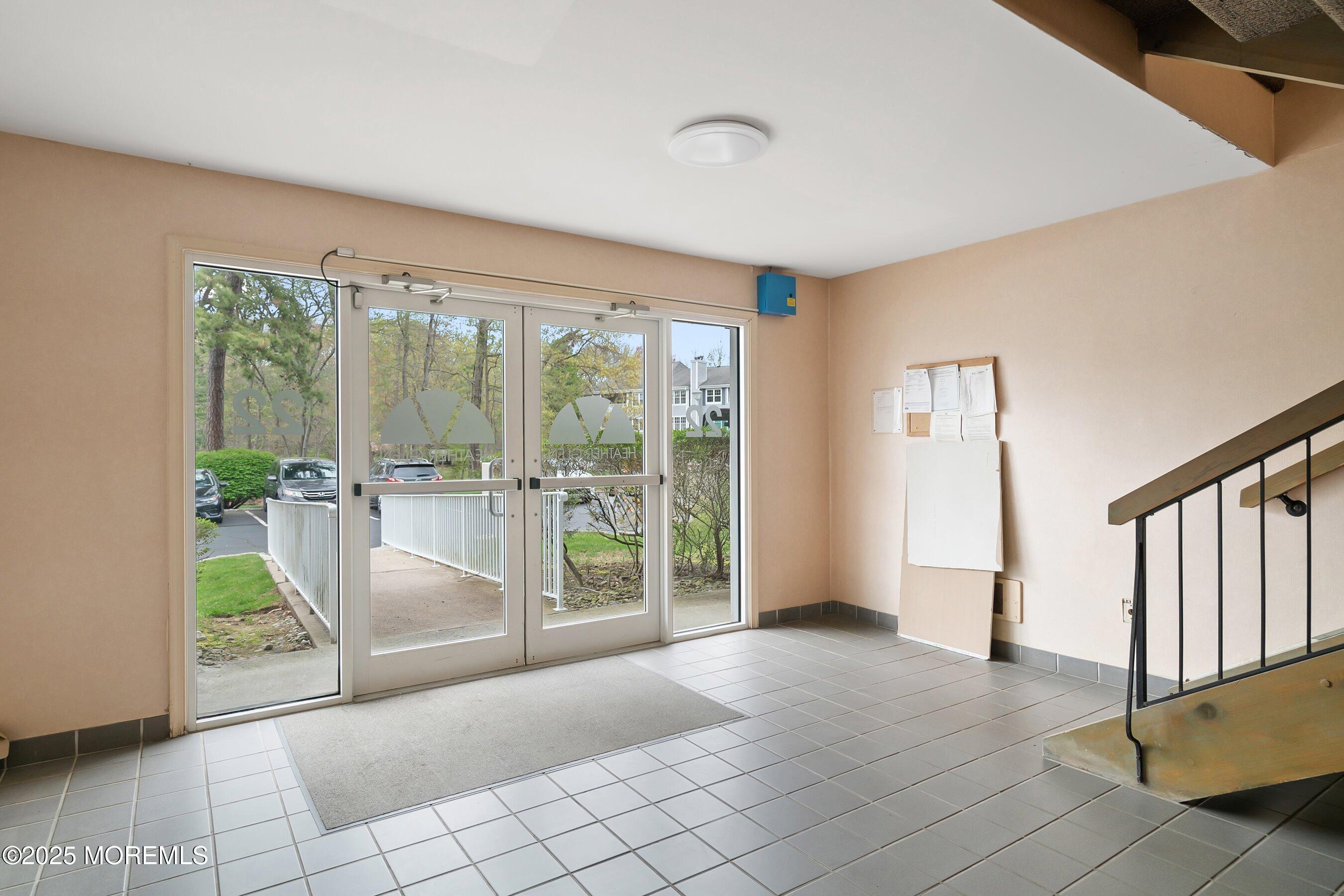 102 Raintree Court, Unit 102 Helmetta, NJ 08828 - Photo 5 of 23 24-Lobby 2