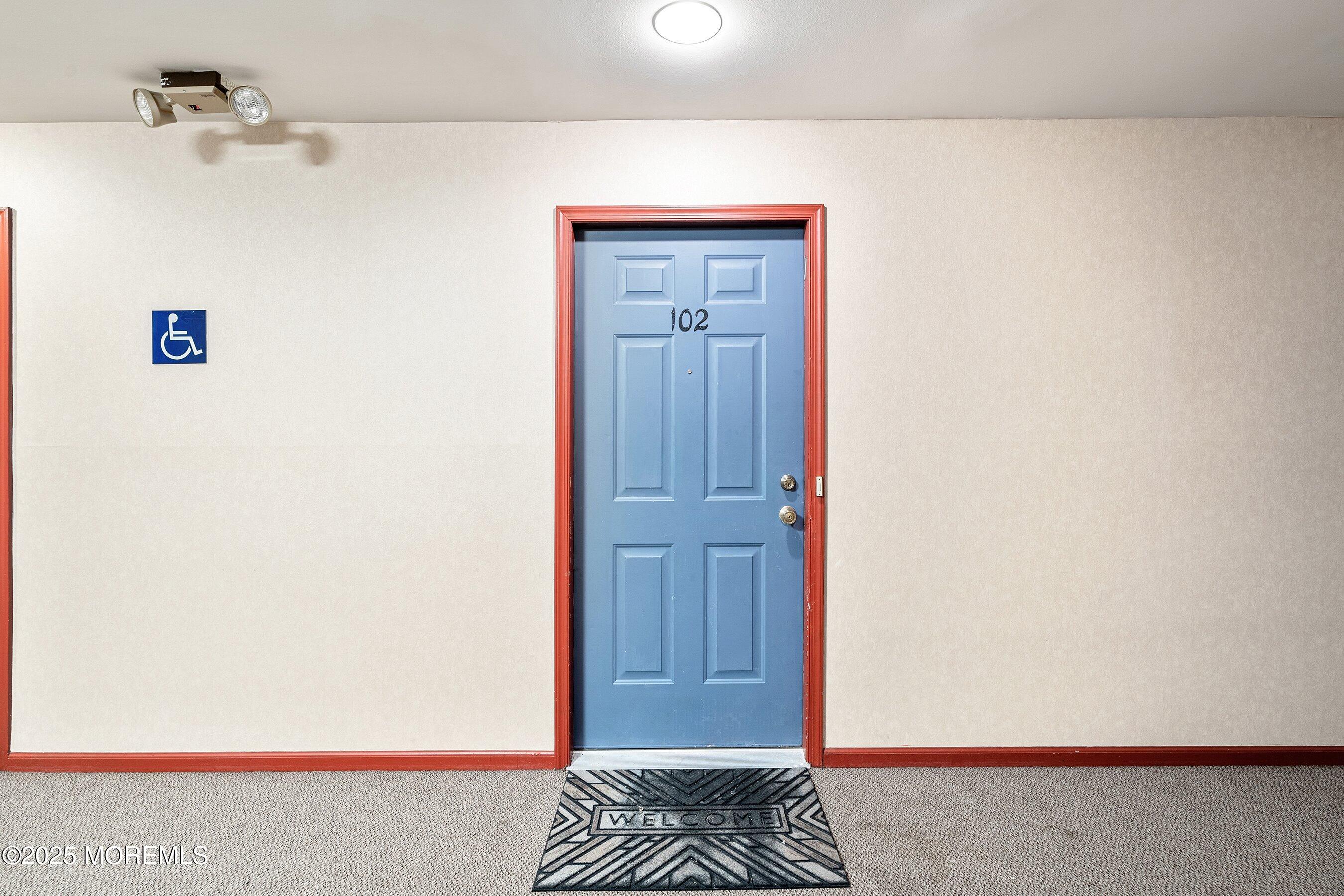 102 Raintree Court, Unit 102 Helmetta, NJ 08828 - Photo 6 of 23 05-Front Door