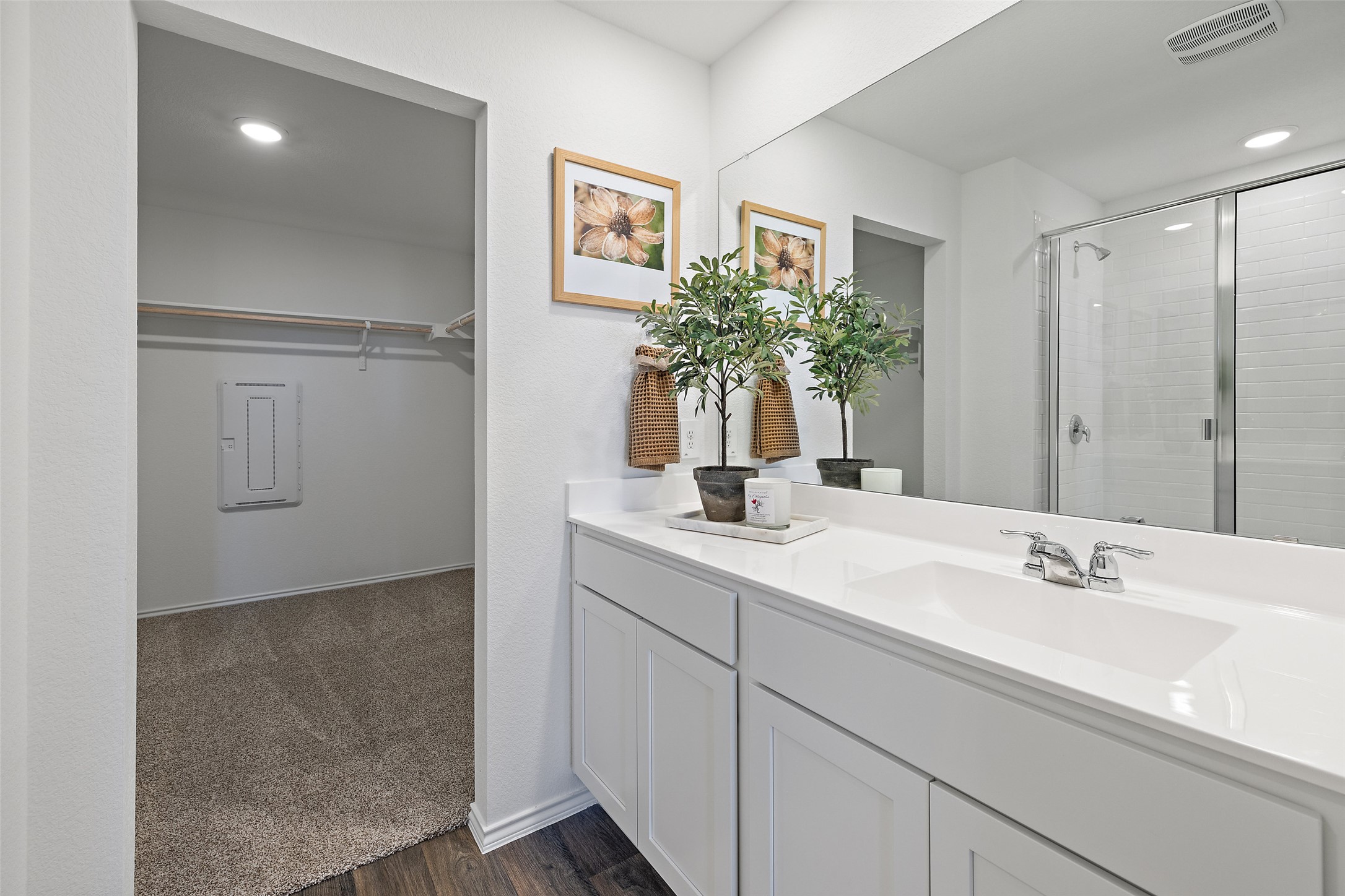 879 Arnold Loop Kyle, TX 78640 - Photo 22 of 33 a bathroom with a sink and a mirror