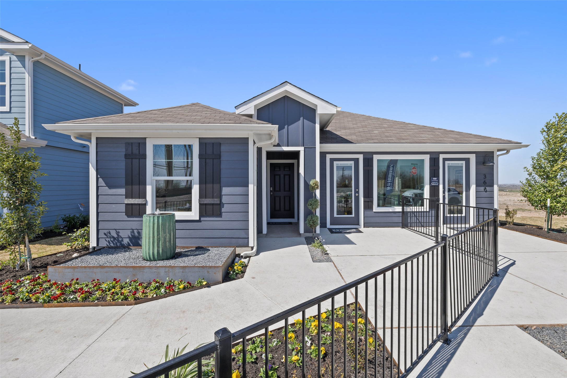 879 Arnold Loop Kyle, TX 78640 - Photo 4 of 33 a view of a house with sitting area