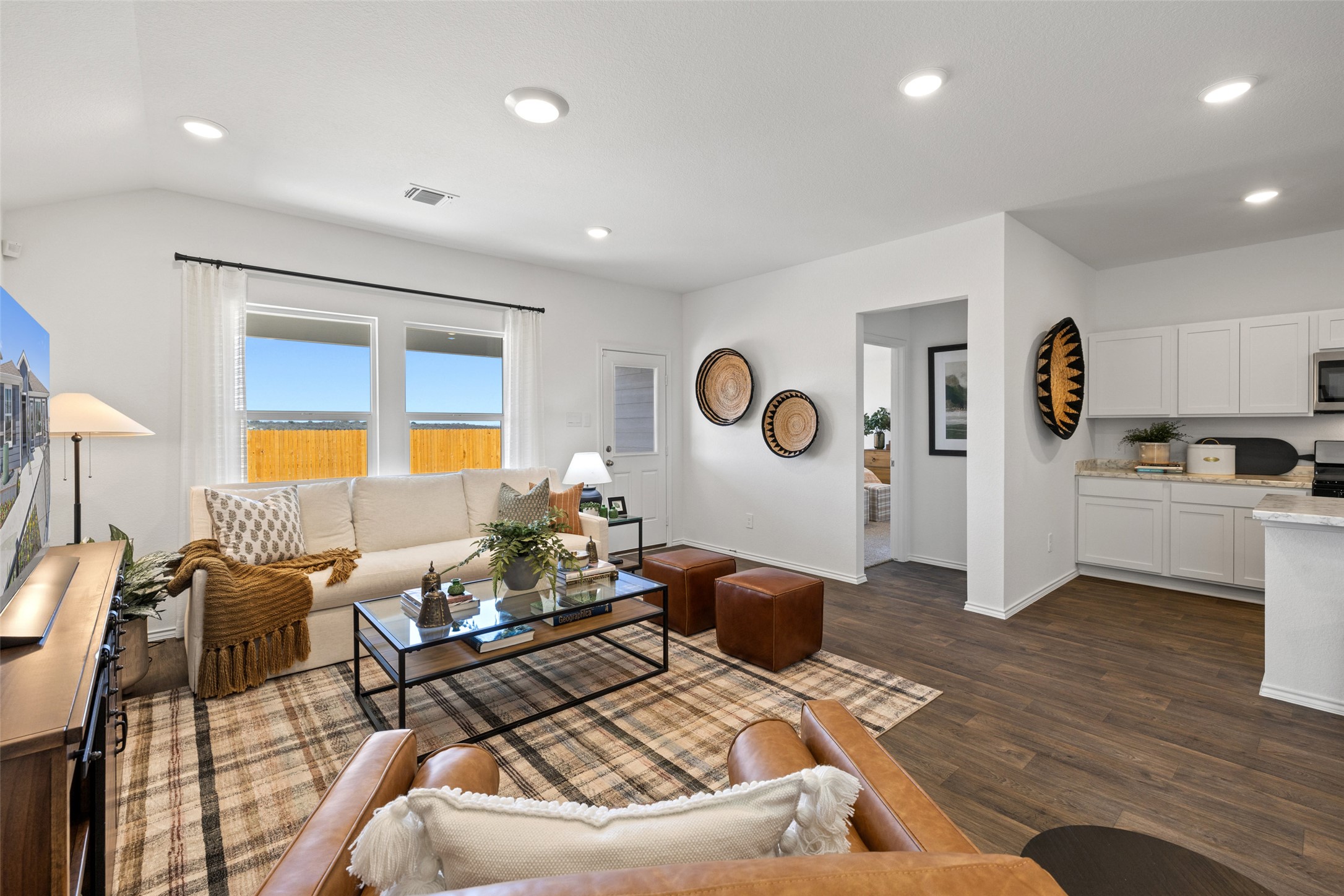 879 Arnold Loop Kyle, TX 78640 - Photo 7 of 33 a living room with furniture and wooden floor