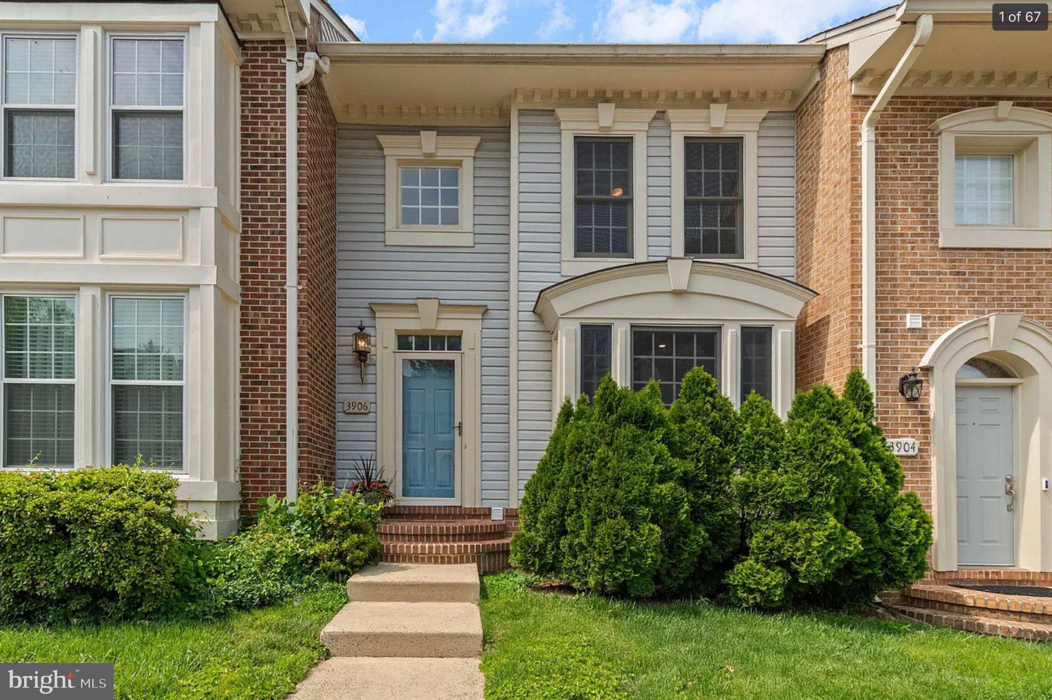 3906 Valley Ridge Drive Fairfax, VA 22033 - Photo 1 of 58 Charming townhouse with lush greenery.