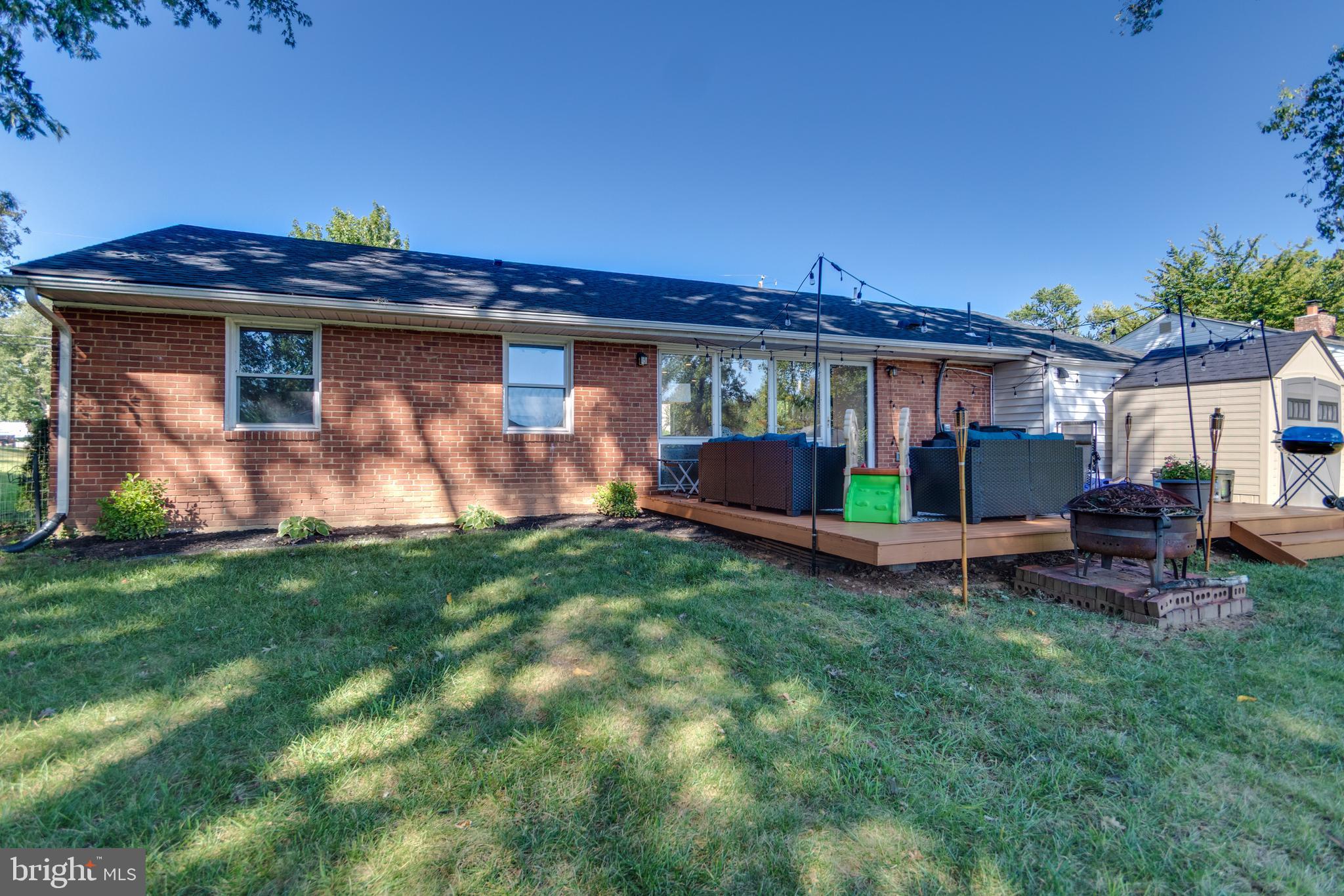 7431 Axton Street Springfield, VA 22151 - Photo 21 of 23 a view of a backyard with a garden and plants