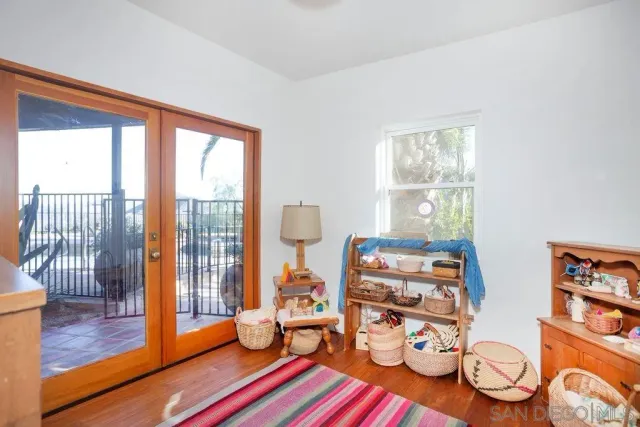 a room with furniture and a large window