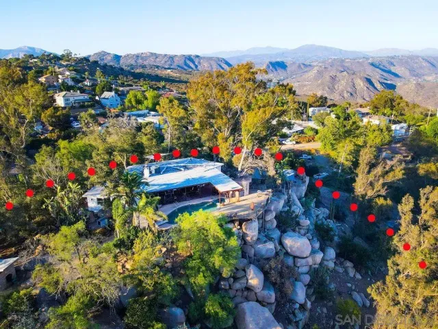 a view of a backyard of the house
