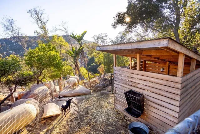 a view of pathway with a wrought fence