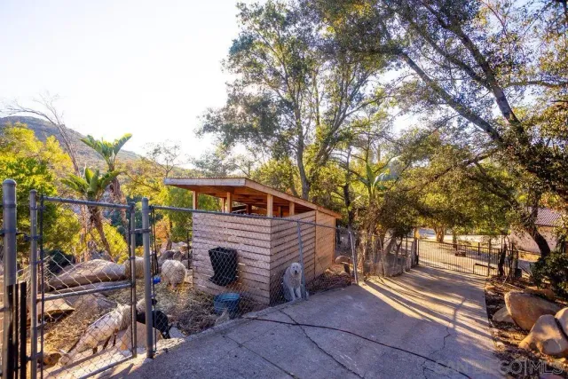 a bed room with a bed and a chandelier