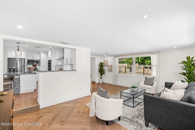 a bedroom with a bed and a table