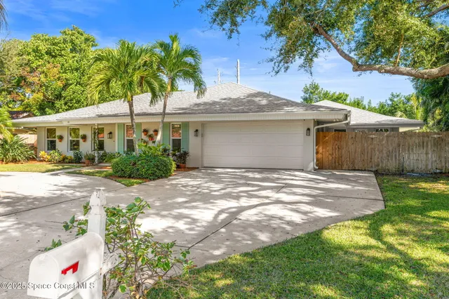 a kitchen with stainless steel appliances granite countertop a sink a stove and a oven