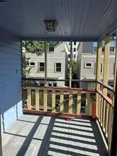 front view of a house with a porch