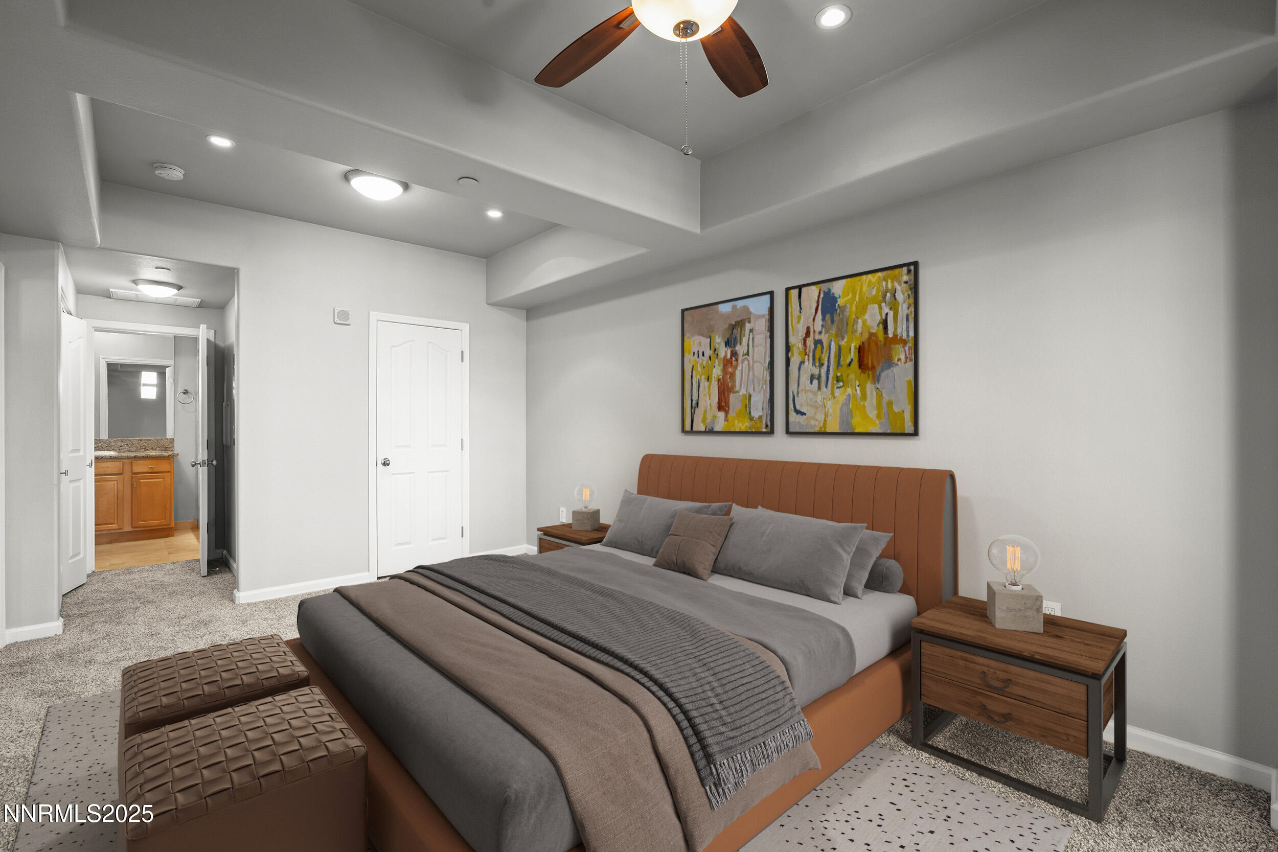 200 West 2nd Street, Unit 502 Reno, NV 89501 - Photo 5 of 35 a bedroom with a bed and painting on the wall