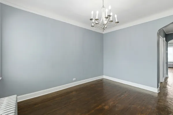 a view of a chandelier in big room