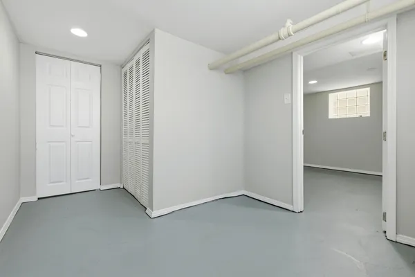 an empty room with windows