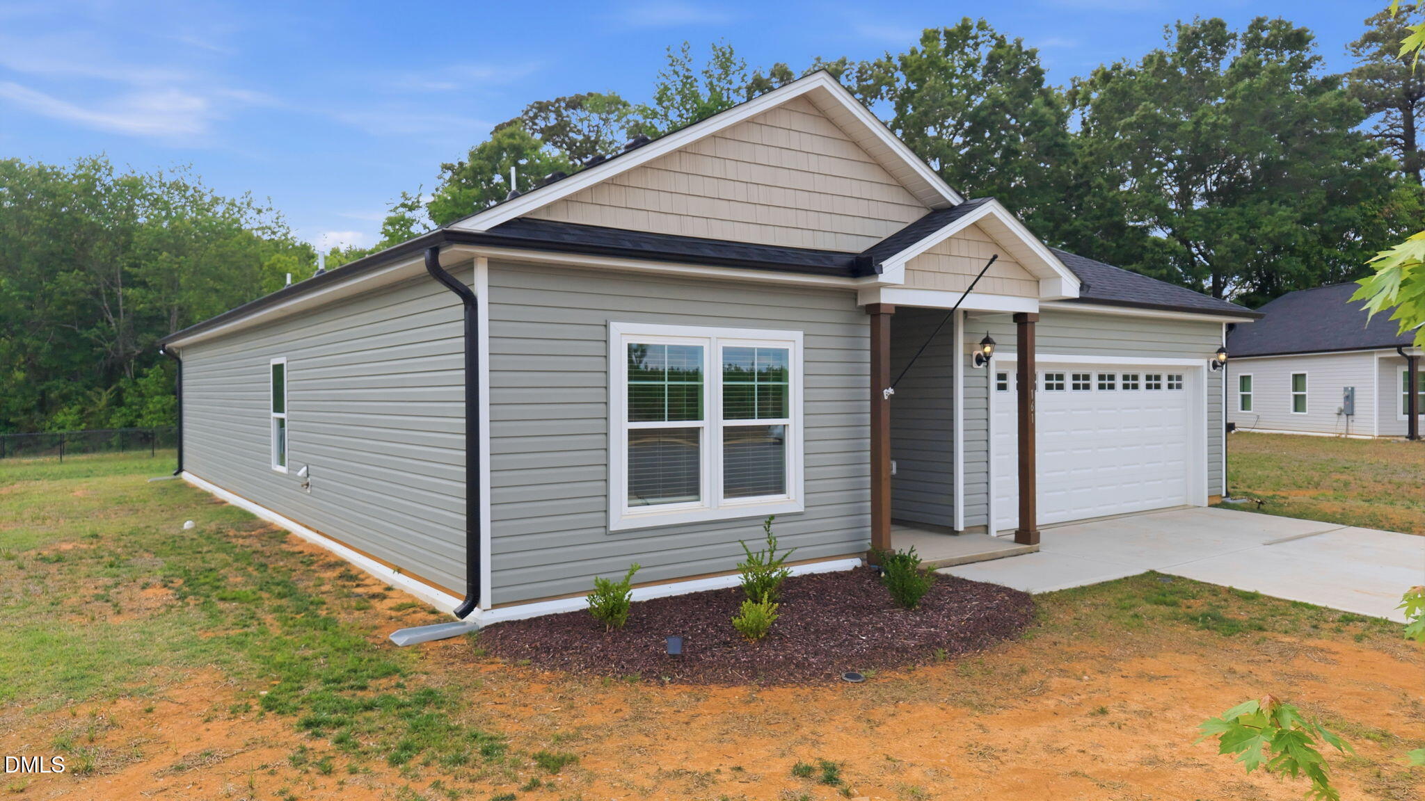 161 Tupelo Dr Spring Spring Hope, NC 27882 - Photo 3 of 28 a front view of a house with a yard
