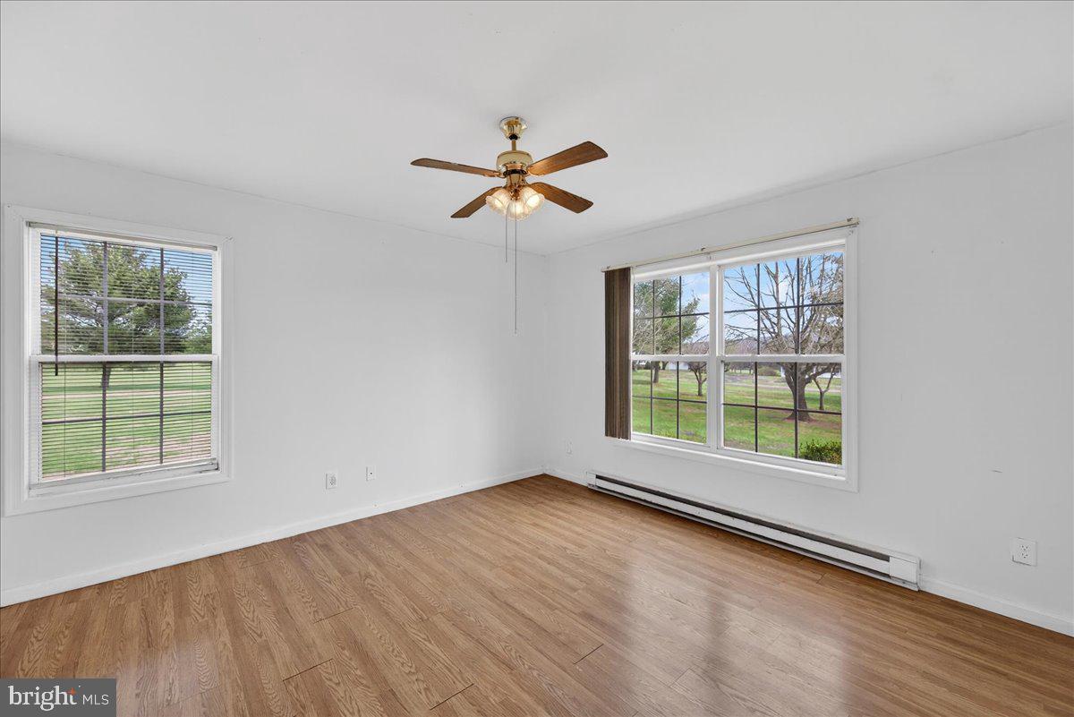 28042 Rapidan Road Rapidan, VA 22733 - Photo 22 of 72 wooden floor in an empty room with a window