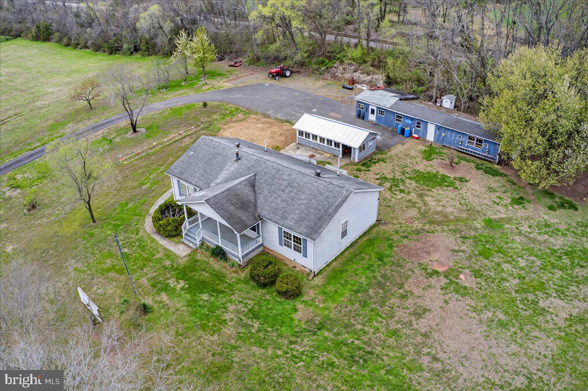 28042 Rapidan Road Rapidan, VA 22733 - Photo 58 of 72 an aerial view of a house with garden space and a lake view