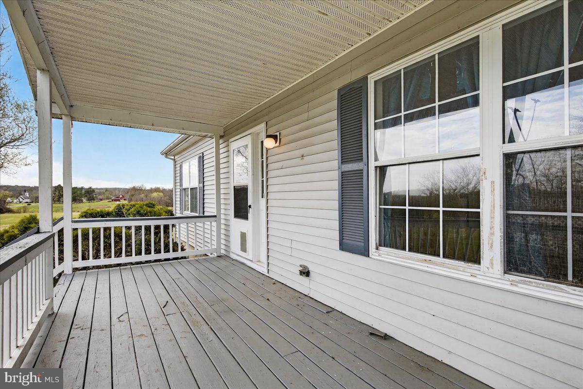 28042 Rapidan Road Rapidan, VA 22733 - Photo 6 of 72 a view of balcony with wooden floor