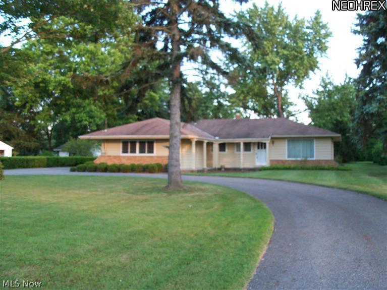 37700 Bainbridge Road Solon, OH 44139 - Photo 1 of 13 Brick & wood Ranch, 2 car attached Garage, 100 X 300 yard. Circular driveway.