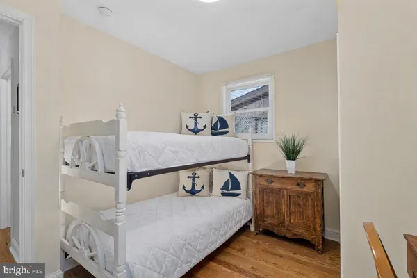 a bedroom with furniture and window