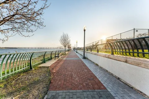 a view of an outdoor space and tennis court