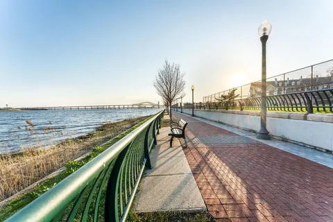 a picture of a bench in front of a door