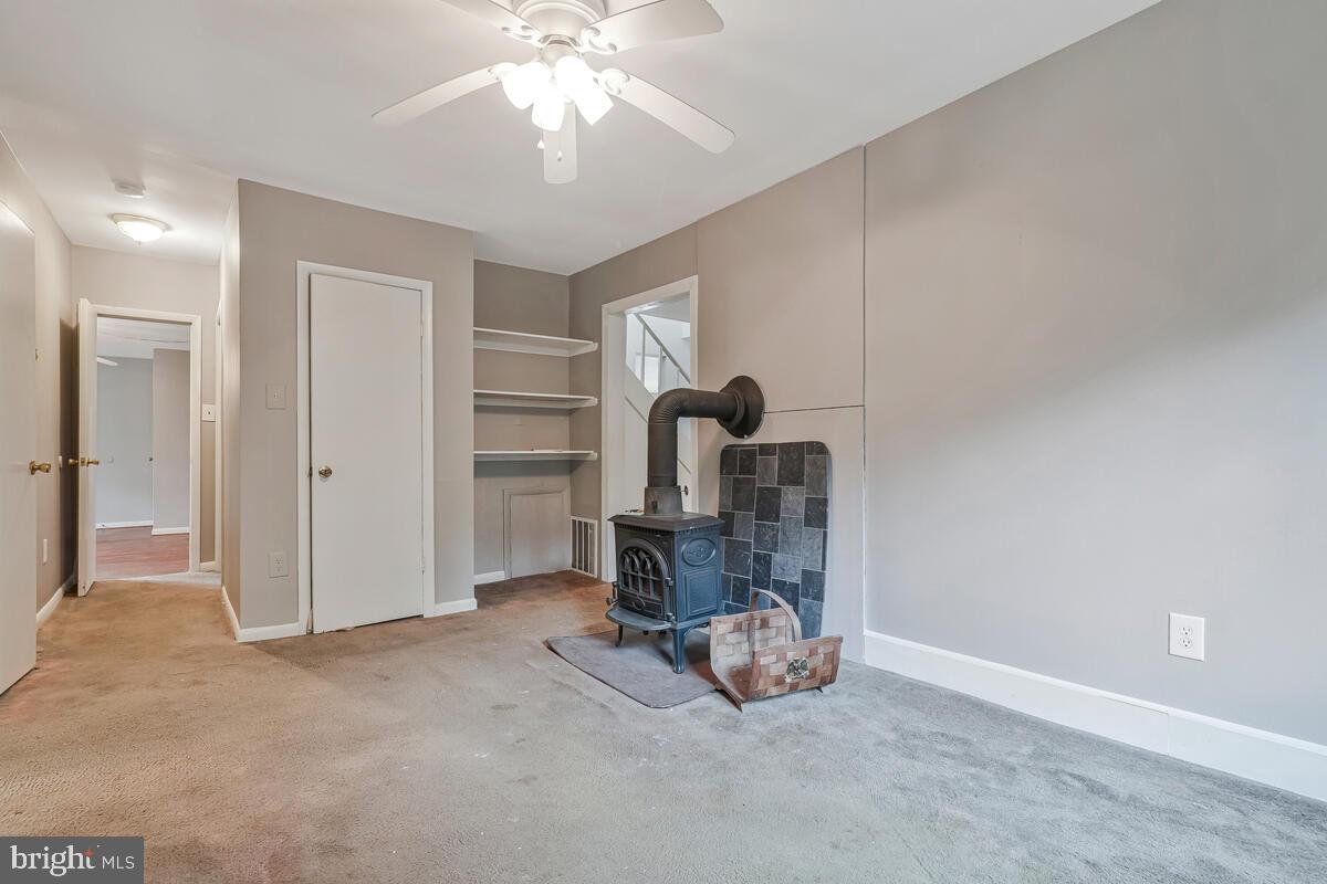 38888 Reeves Road Mechanicsville, MD 20659 - Photo 34 of 50 a view of a livingroom with a fireplace