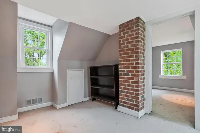 an empty room with windows