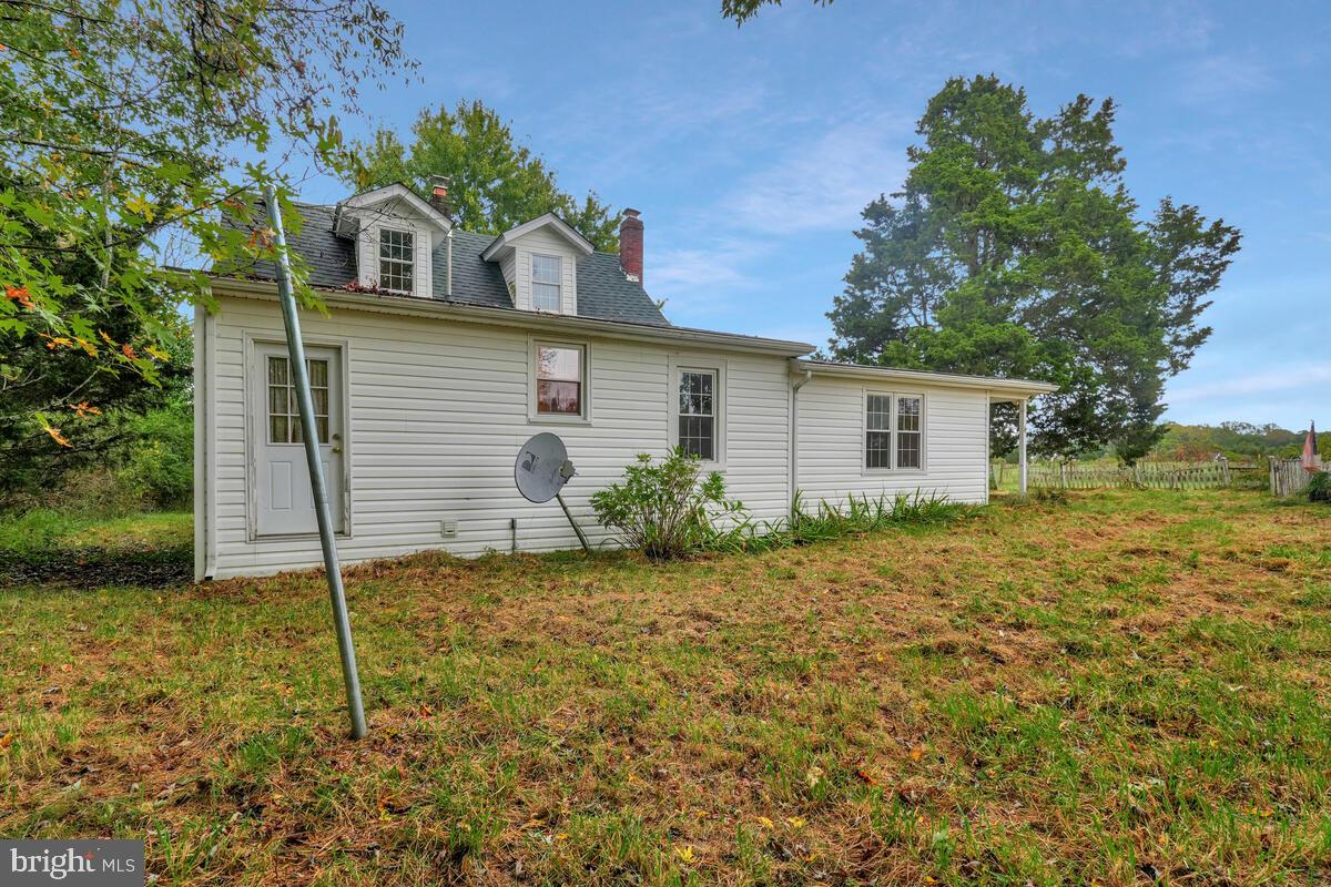 38888 Reeves Road Mechanicsville, MD 20659 - Photo 7 of 50 a house that has a tree in front of it