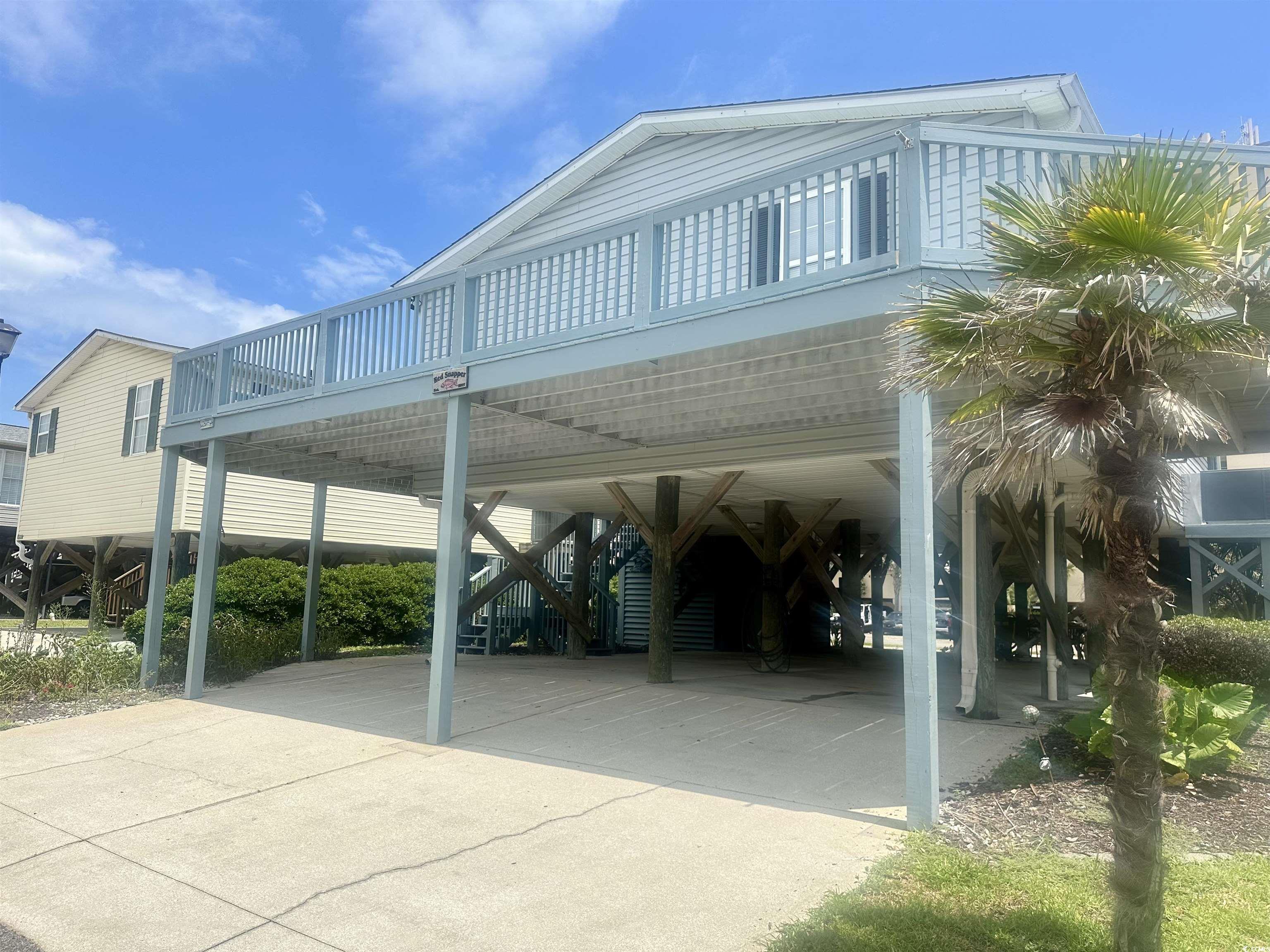 1752 Mason Circle Murrells Inlet, SC 29576 - Photo 29 of 31 View of parking with a carport