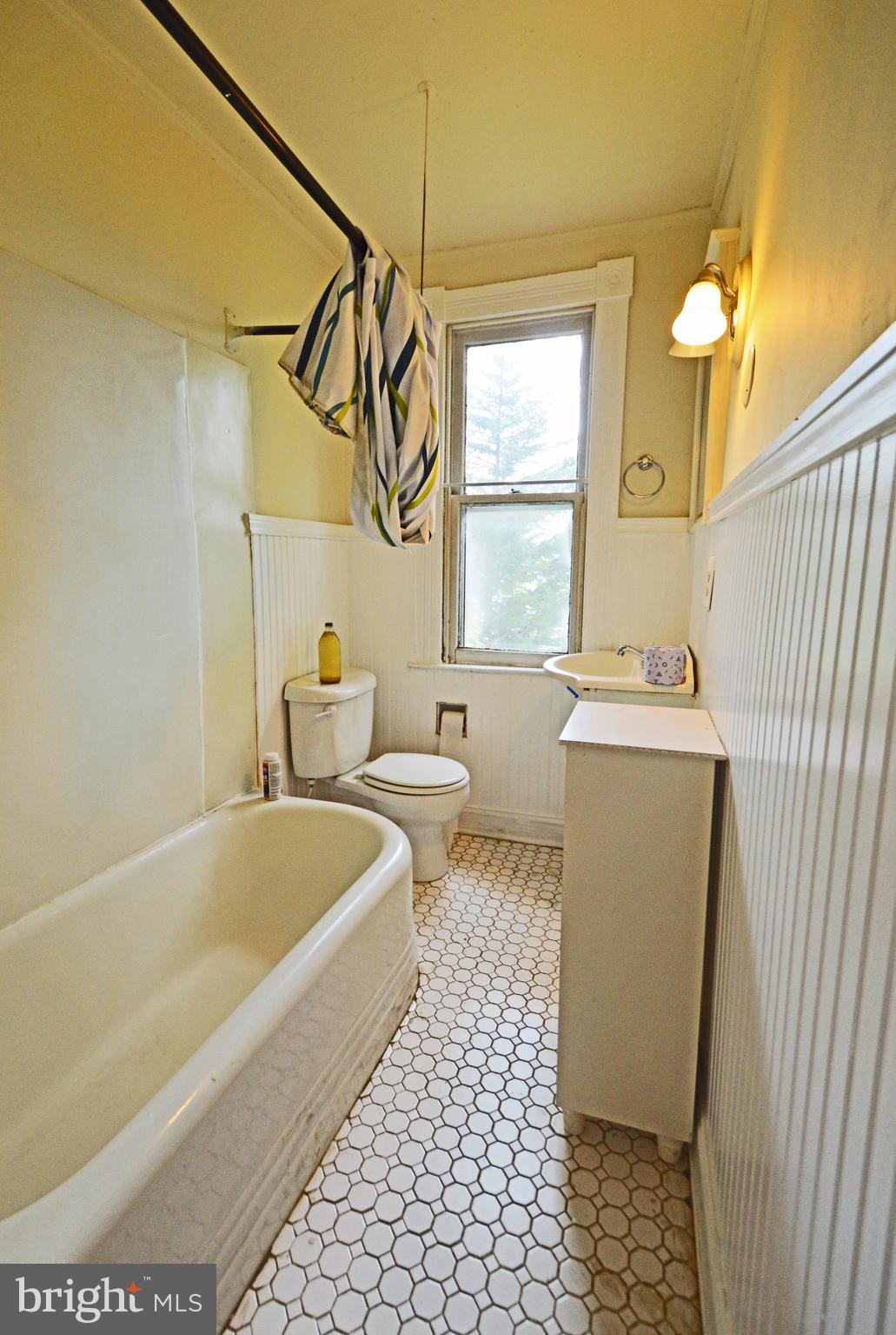 5017 Catalpha Road Baltimore, MD 21214 - Photo 14 of 16 2nd Bathroom Upper Level