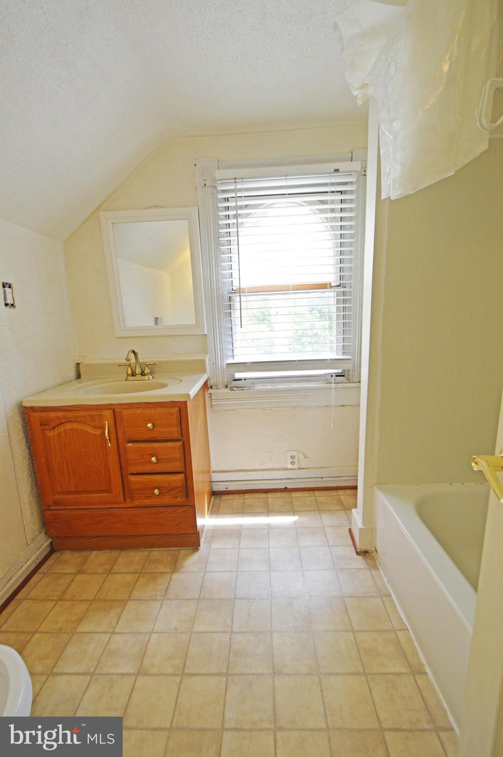 5017 Catalpha Road Baltimore, MD 21214 - Photo 16 of 16 3rd Bathroom 3rd Level