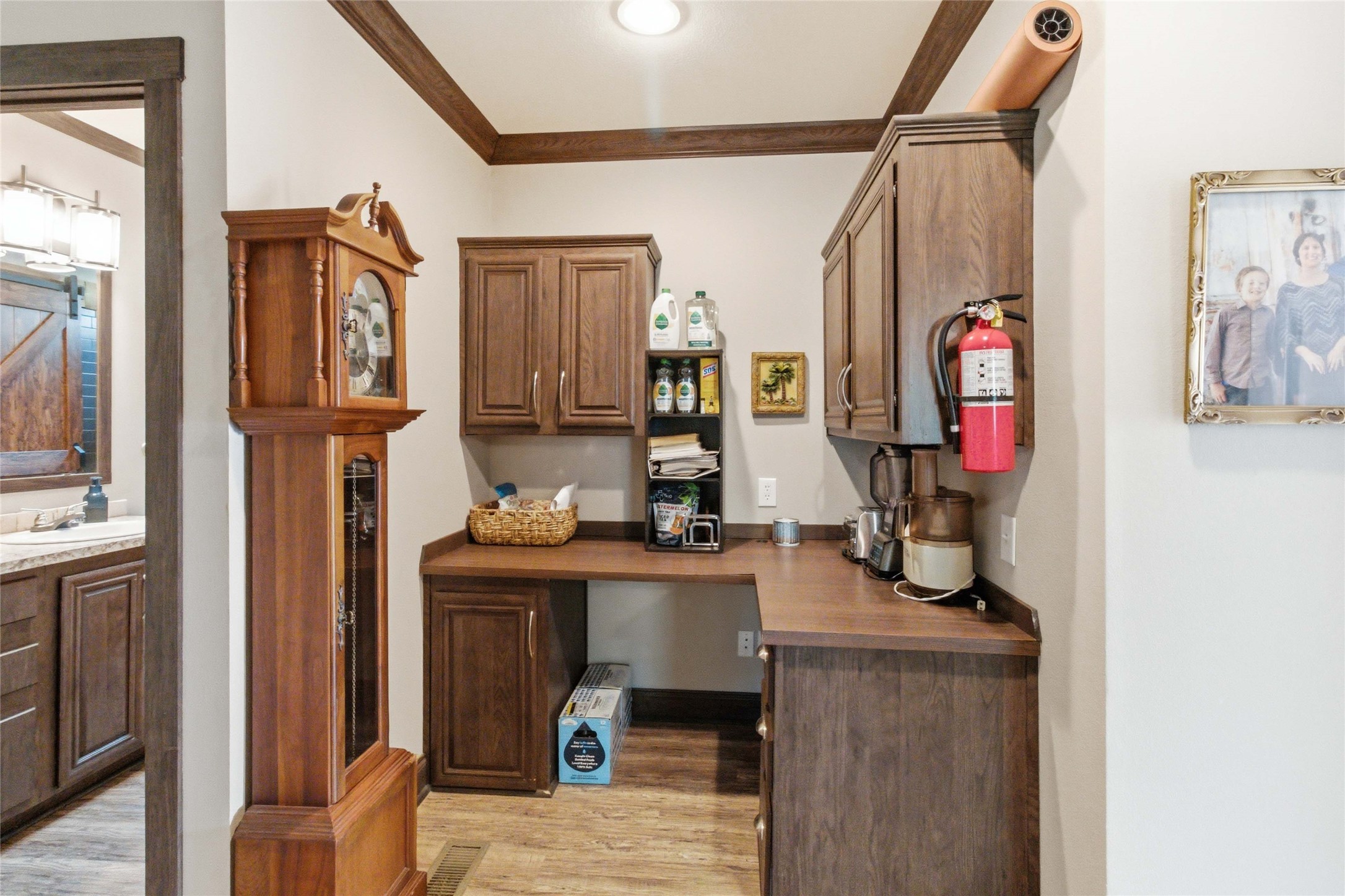 7921 Vista Ranch Road Smithville, TX 78957 - Photo 14 of 39 Functional workspace with rich wood cabinetry provides convenience and organization.