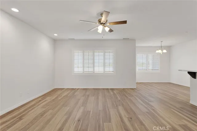 a kitchen with a sink and stove top oven
