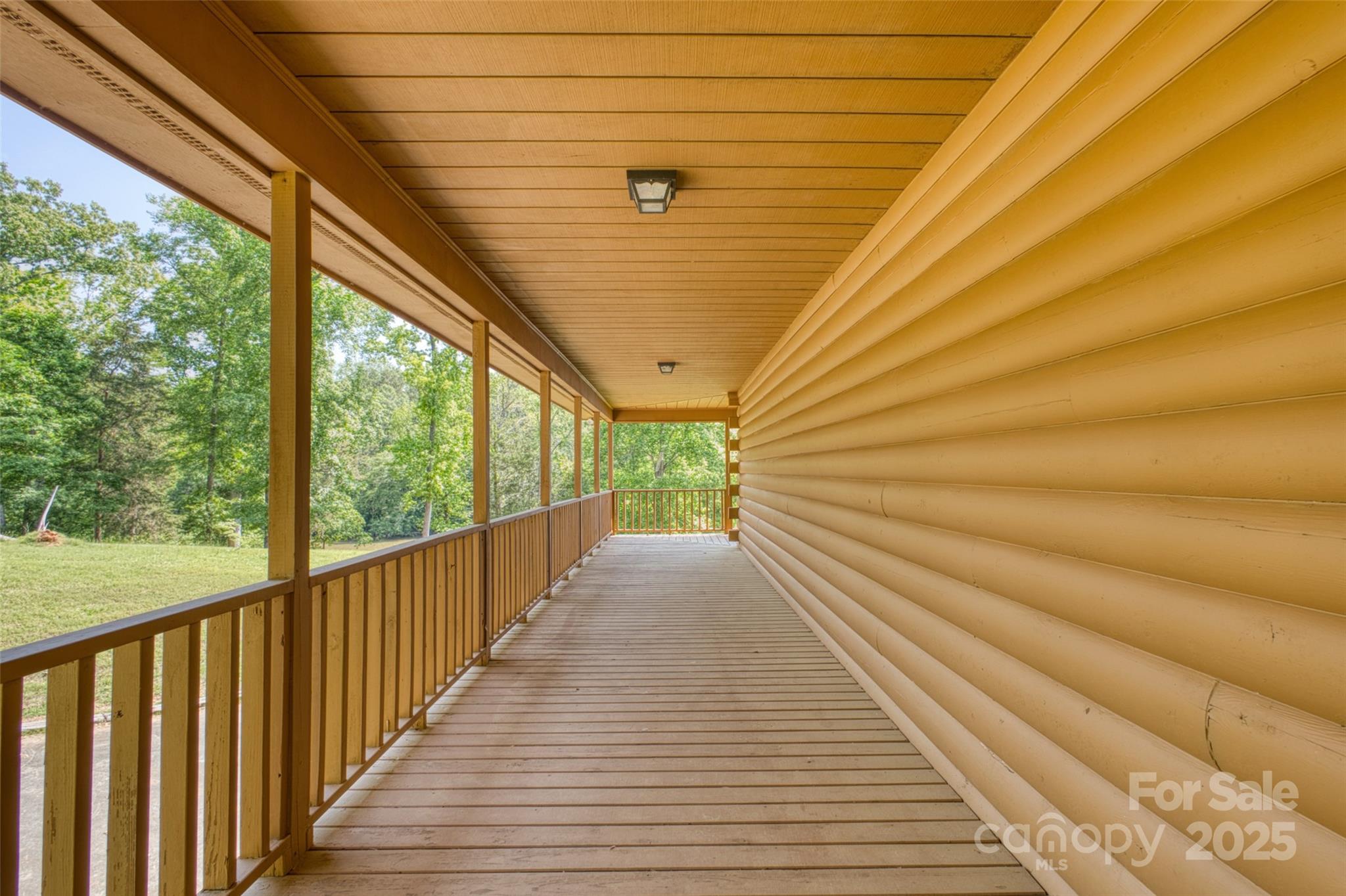 993 Jackson Road Fort Lawn, SC 29714 - Photo 13 of 48 a view of a balcony with wooden floor and staircase