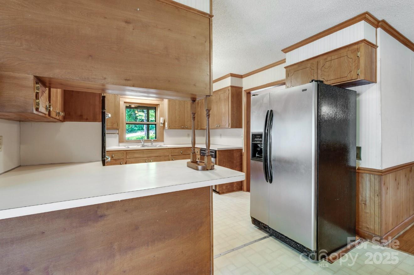 993 Jackson Road Fort Lawn, SC 29714 - Photo 23 of 48 a modern kitchen with stainless steel appliances a refrigerator and a sink