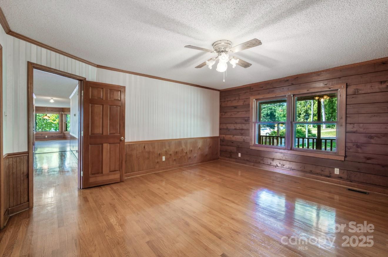 993 Jackson Road Fort Lawn, SC 29714 - Photo 29 of 48 a view of an empty room with wooden floor and a window