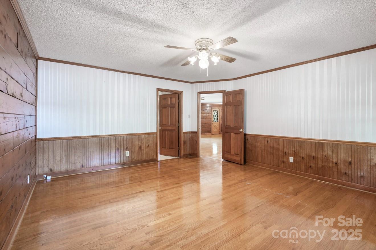 993 Jackson Road Fort Lawn, SC 29714 - Photo 30 of 48 wooden floor in an empty room with a window