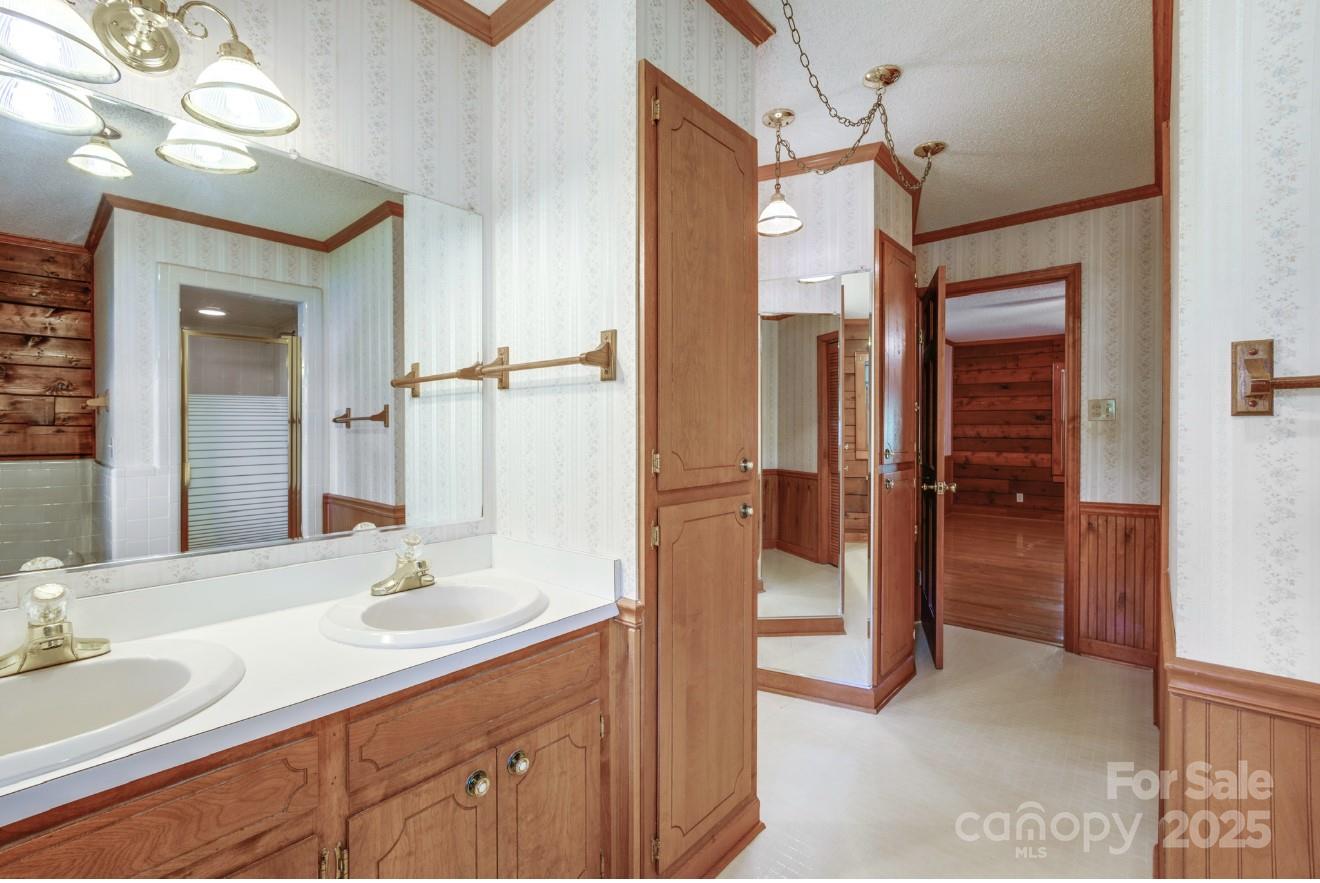 993 Jackson Road Fort Lawn, SC 29714 - Photo 33 of 48 a bathroom with a sink a vanity and a mirror